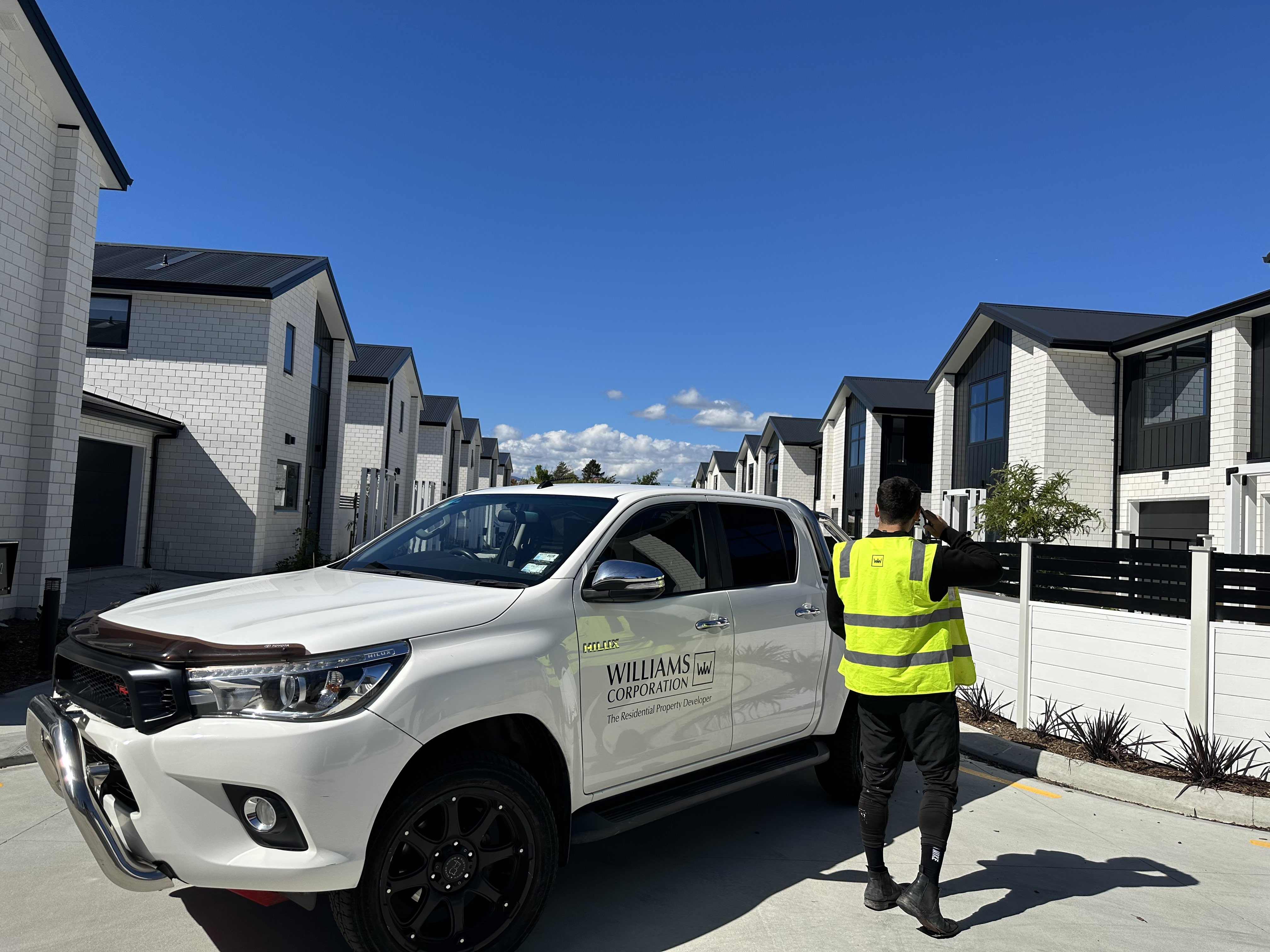Mathieson Moller on site at Williams Corporation, with completed townhouses